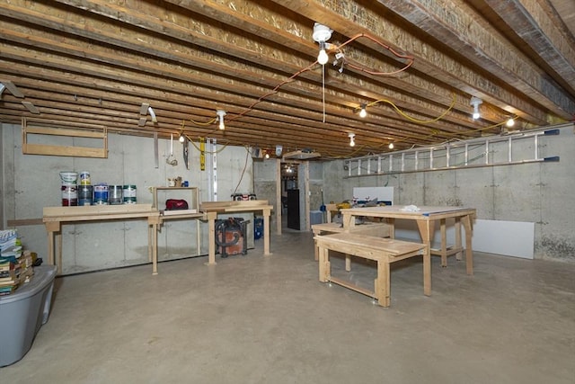12 Crosby, Webster, MA 01570 - unfinished below grade area with a workshop area