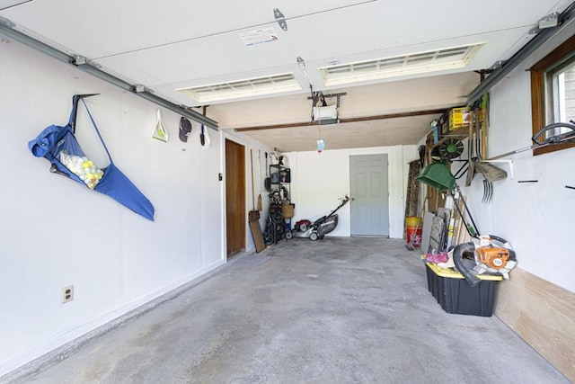 12 Crosby, Webster, MA 01570 - garage featuring a garage door opener