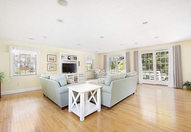 12 Crosby, Webster, MA 01570 - living room featuring light wood-type flooring, baseboards, and recessed lighting