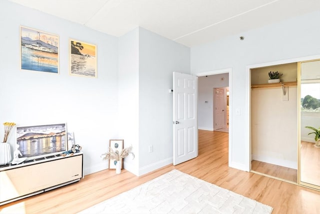200 Cove Way Unit 106, Quincy, MA 02169 - bedroom featuring wood finished floors and a closet