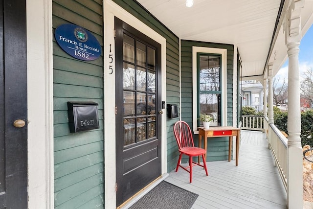 wooden terrace with covered porch