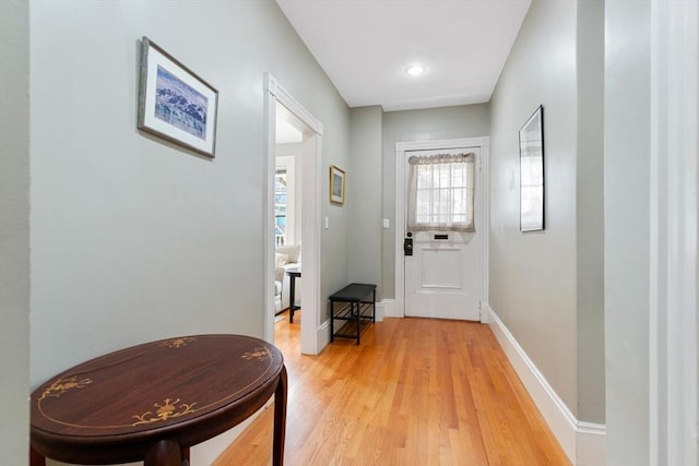 entryway with light hardwood / wood-style floors and a wealth of natural light