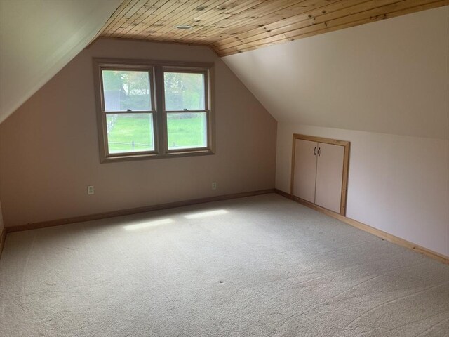 52 Burnett St, Granby, MA 01033 - additional living space with light carpet, baseboards, vaulted ceiling, and wooden ceiling