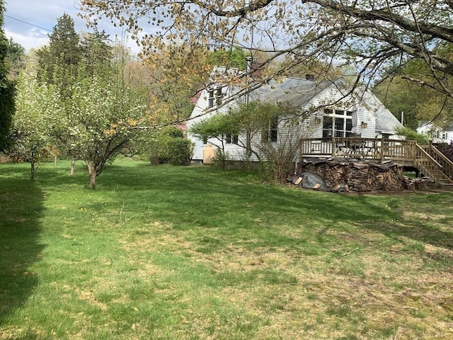 52 Burnett St, Granby, MA 01033 - view of grassy yard featuring a deck