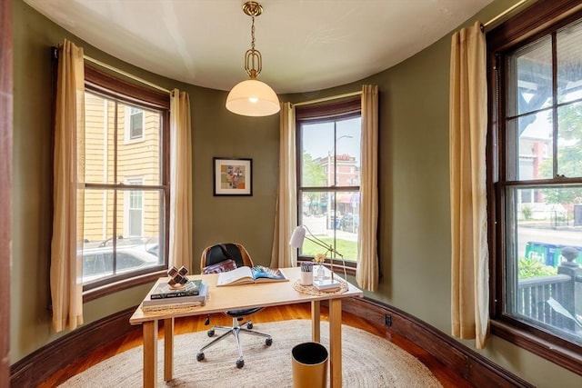 140 Highland Ave Unit 1, Somerville, MA 02143 - office with wood finished floors, healthy amount of natural light, and baseboards