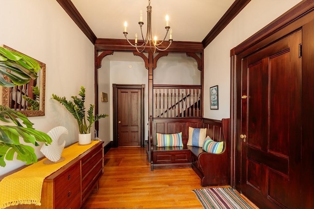 140 Highland Ave Unit 1, Somerville, MA 02143 - sitting room with a chandelier, ornamental molding, and wood finished floors