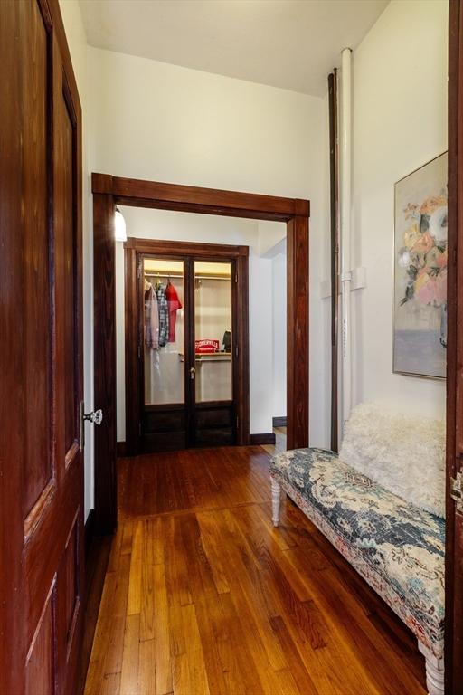 140 Highland Ave Unit 1, Somerville, MA 02143 - hall featuring dark wood-type flooring and french doors