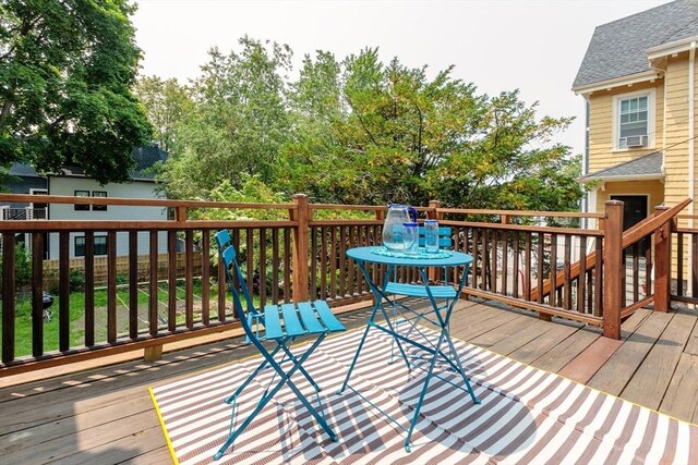 140 Highland Ave Unit 1, Somerville, MA 02143 - wooden terrace with cooling unit