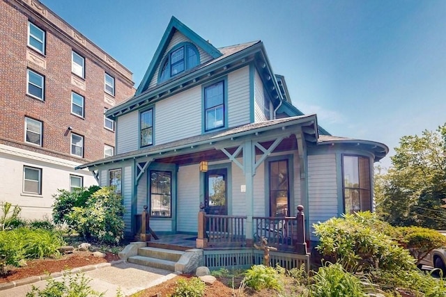 140 Highland Ave Unit 1, Somerville, MA 02143 - view of front of house with covered porch