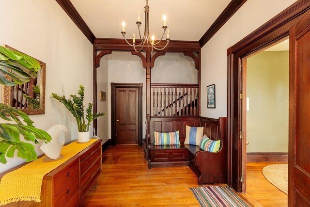 140 Highland Ave Unit 1, Somerville, MA 02143 - corridor with a chandelier, crown molding, and wood finished floors