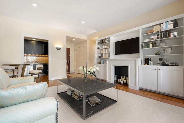 living room with hardwood / wood-style flooring