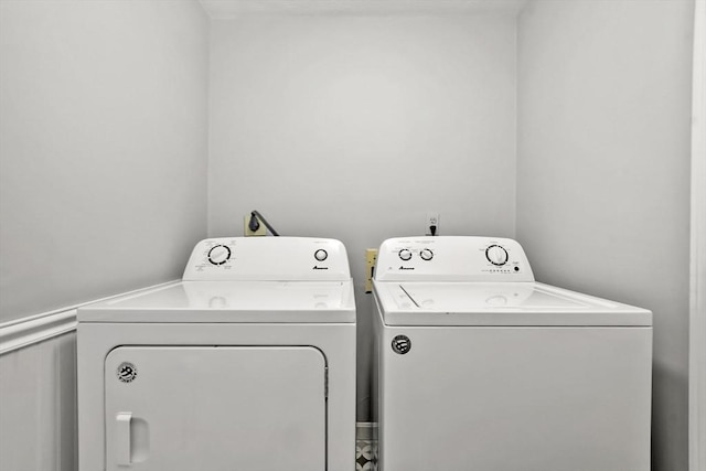 laundry area featuring laundry area and washer and clothes dryer