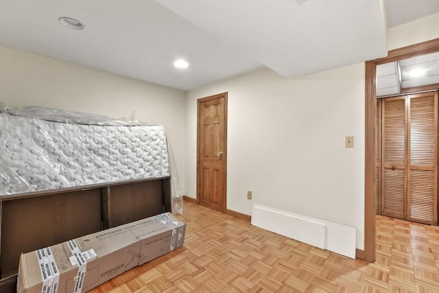 bedroom featuring recessed lighting and baseboards