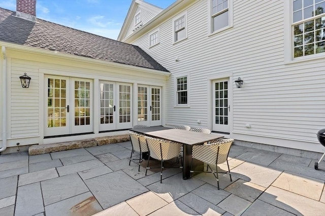 view of patio / terrace with outdoor dining area and french doors