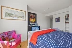 bedroom featuring hardwood / wood-style flooring