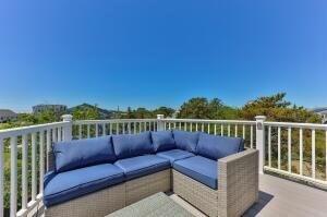 wooden terrace featuring an outdoor hangout area