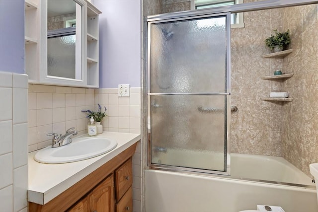 162 Park St Unit 1, Beverly, MA 01915 - full bath featuring vanity, enclosed tub / shower combo, and tile walls