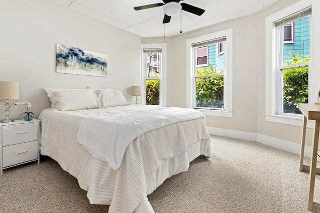162 Park St Unit 1, Beverly, MA 01915 - carpeted bedroom featuring multiple windows, ceiling fan, and baseboards
