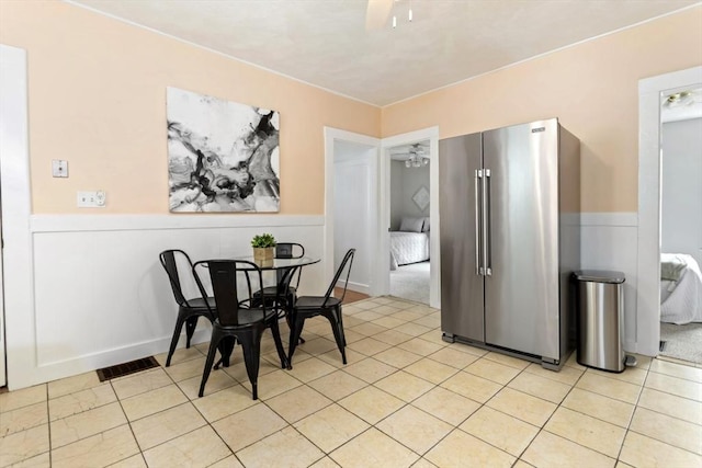 162 Park St Unit 1, Beverly, MA 01915 - dining space featuring a wainscoted wall, light tile patterned flooring, and ceiling fan