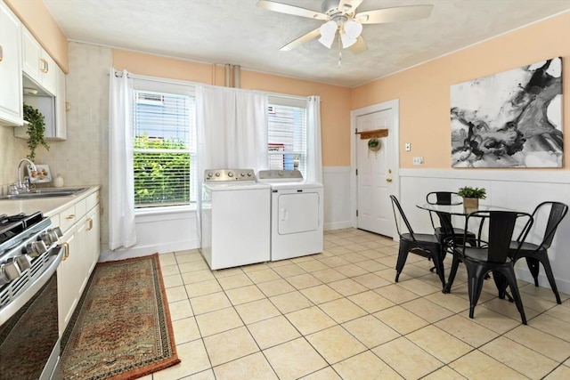 162 Park St Unit 1, Beverly, MA 01915 - kitchen with a sink, stainless steel range with gas stovetop, washing machine and dryer, and healthy amount of natural light