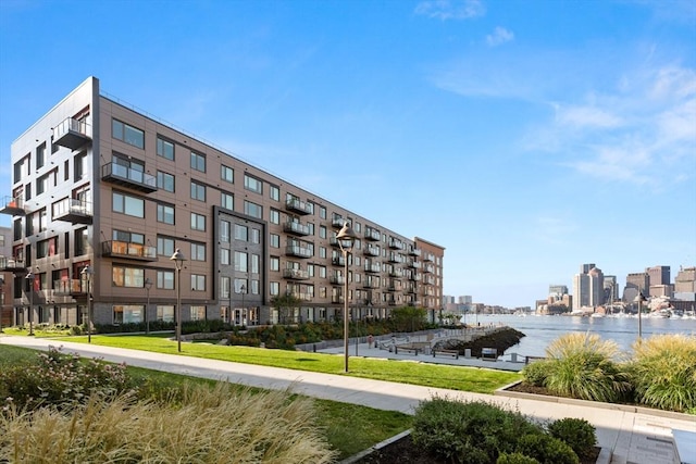 view of building exterior featuring a water view