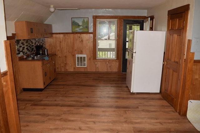 1407-1409 Worcester St, Springfield, MA 01151 - kitchen featuring freestanding refrigerator, heating unit, light wood finished floors, wooden walls, and lofted ceiling