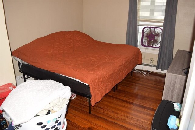 1407-1409 Worcester St, Springfield, MA 01151 - bedroom featuring wood finished floors and a baseboard radiator