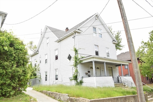 1407-1409 Worcester St, Springfield, MA 01151 - view of front of property featuring a porch