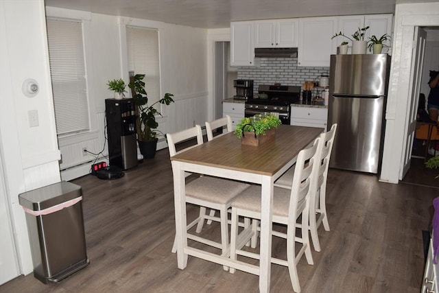 1407-1409 Worcester St, Springfield, MA 01151 - dining space with dark wood-type flooring and baseboard heating
