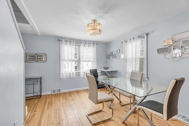 dining room featuring hardwood / wood-style flooring