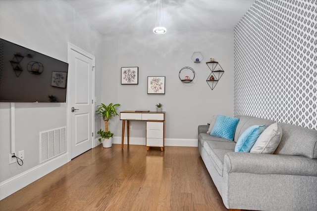 8 Sanborn St Unit 2012, Reading, MA 01867 - living area with wood finished floors and baseboards