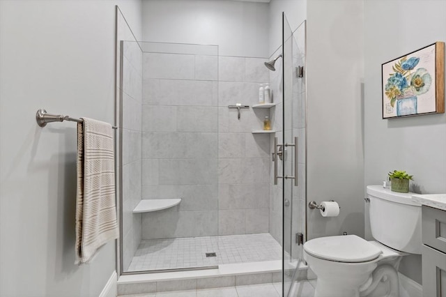 8 Sanborn St Unit 2012, Reading, MA 01867 - bathroom with a shower stall, toilet, vanity, and tile patterned flooring