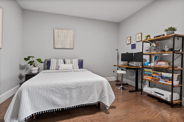 8 Sanborn St Unit 2012, Reading, MA 01867 - bedroom featuring baseboards and wood finished floors
