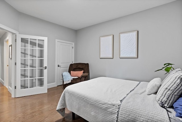 8 Sanborn St Unit 2012, Reading, MA 01867 - bedroom featuring wood finished floors and baseboards