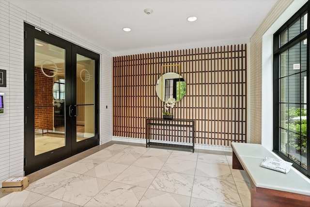 8 Sanborn St Unit 2012, Reading, MA 01867 - entryway featuring french doors, marble finish floors, and recessed lighting