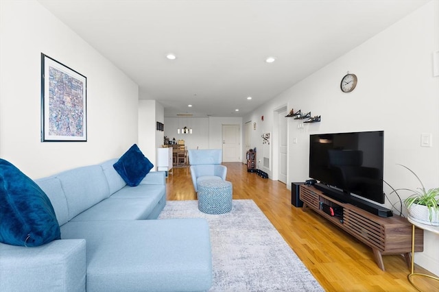 318 Rindge Ave Unit 411, Cambridge, MA 02140 - living room with light wood-style flooring and recessed lighting