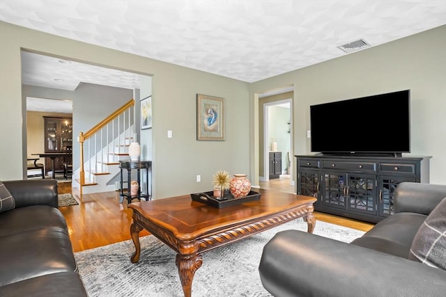 15 Hillside St, Rowley, MA 01969 - living room featuring wood finished floors and stairs