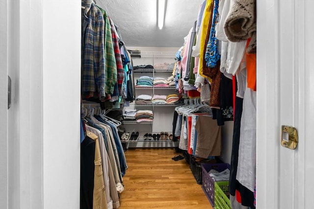 15 Hillside St, Rowley, MA 01969 - walk in closet featuring wood finished floors