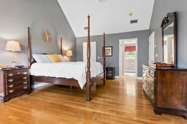 15 Hillside St, Rowley, MA 01969 - bedroom featuring lofted ceiling, light wood-style flooring, and a baseboard heating unit