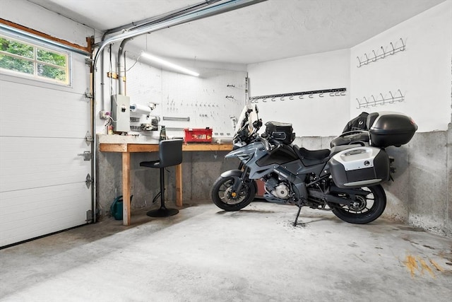15 Hillside St, Rowley, MA 01969 - garage with a workshop area and electric panel