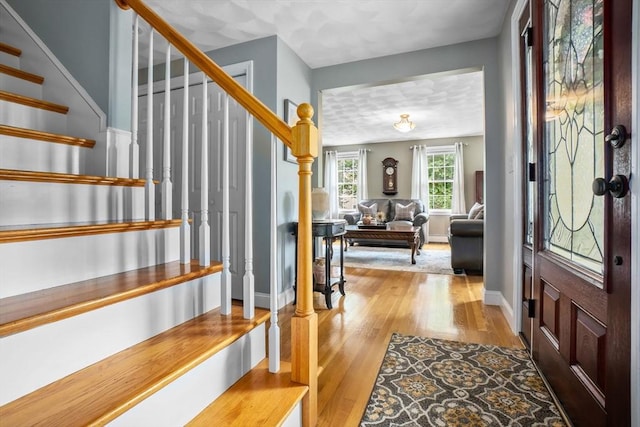 15 Hillside St, Rowley, MA 01969 - foyer with stairway and wood finished floors