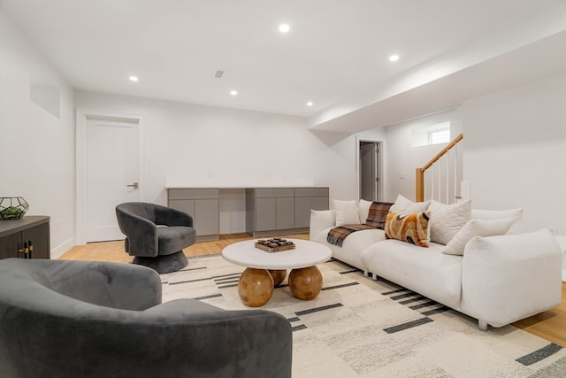 living room with light hardwood / wood-style flooring