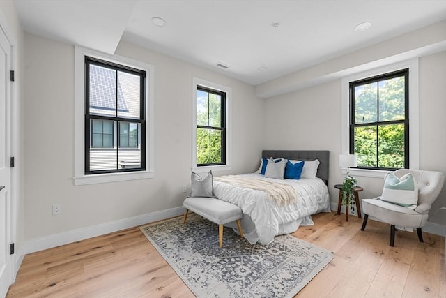 bedroom featuring light hardwood / wood-style floors