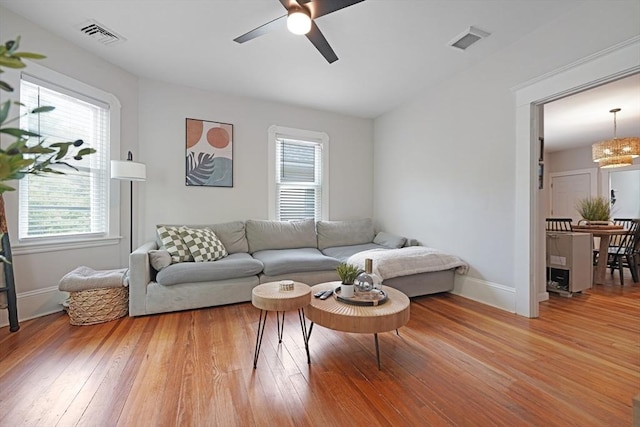 180 Irvington St, New Bedford, MA 02745 - living room featuring ceiling fan, light wood-type flooring, and baseboards