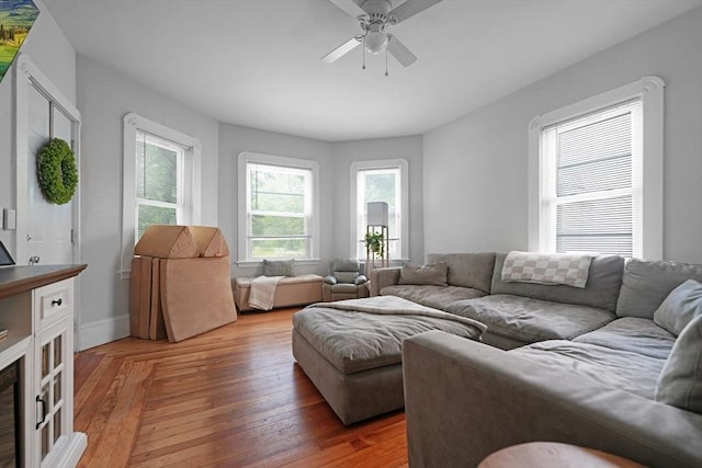 180 Irvington St, New Bedford, MA 02745 - living area with ceiling fan and light wood finished floors