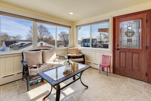 sunroom / solarium with a baseboard radiator