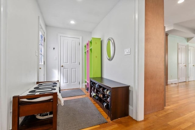 foyer entrance featuring recessed lighting and wood finished floors