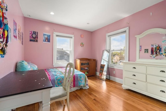 bedroom featuring baseboards, recessed lighting, and light wood-style flooring