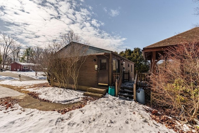 view of snow covered property