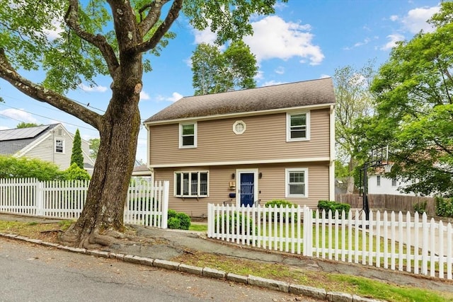 11 Williams St, Arlington, MA 02476 - colonial home featuring a fenced front yard